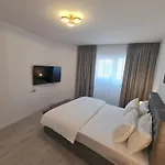 Апартаменты Two Bedroom Parking Timpuri Noi